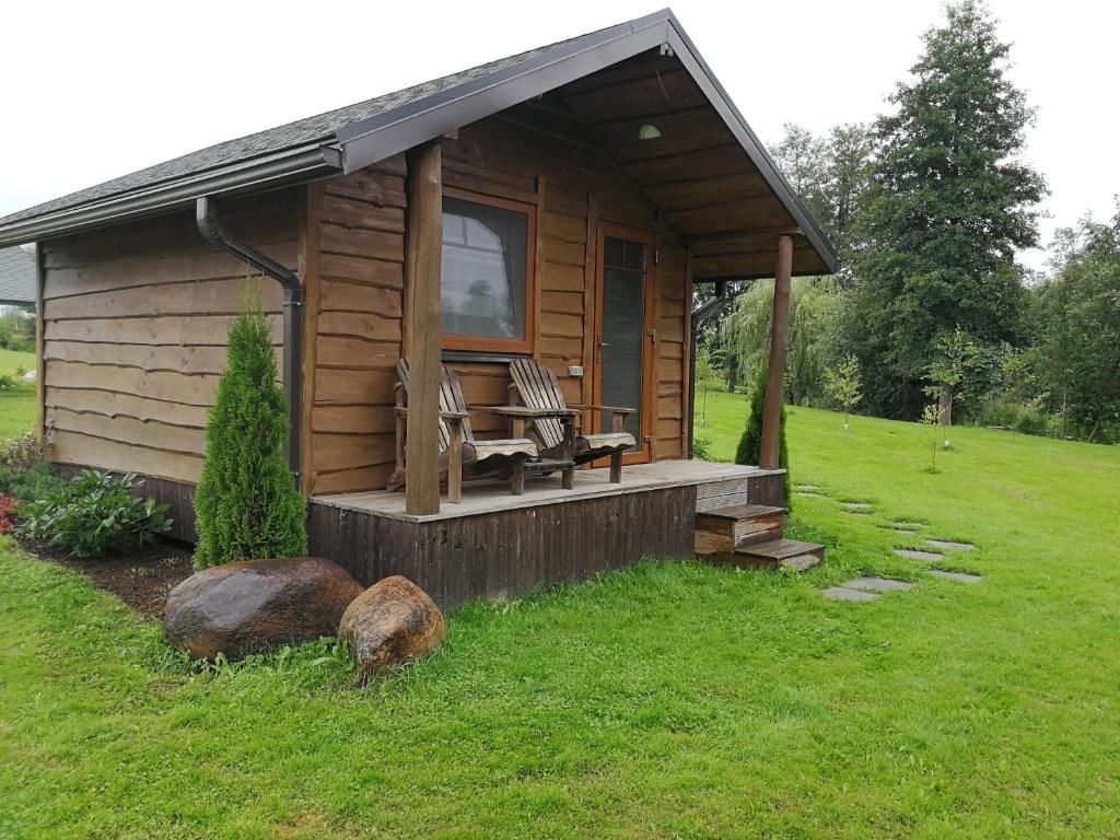 Кемпинги Iecupes wooden cabin with view to river Иецава