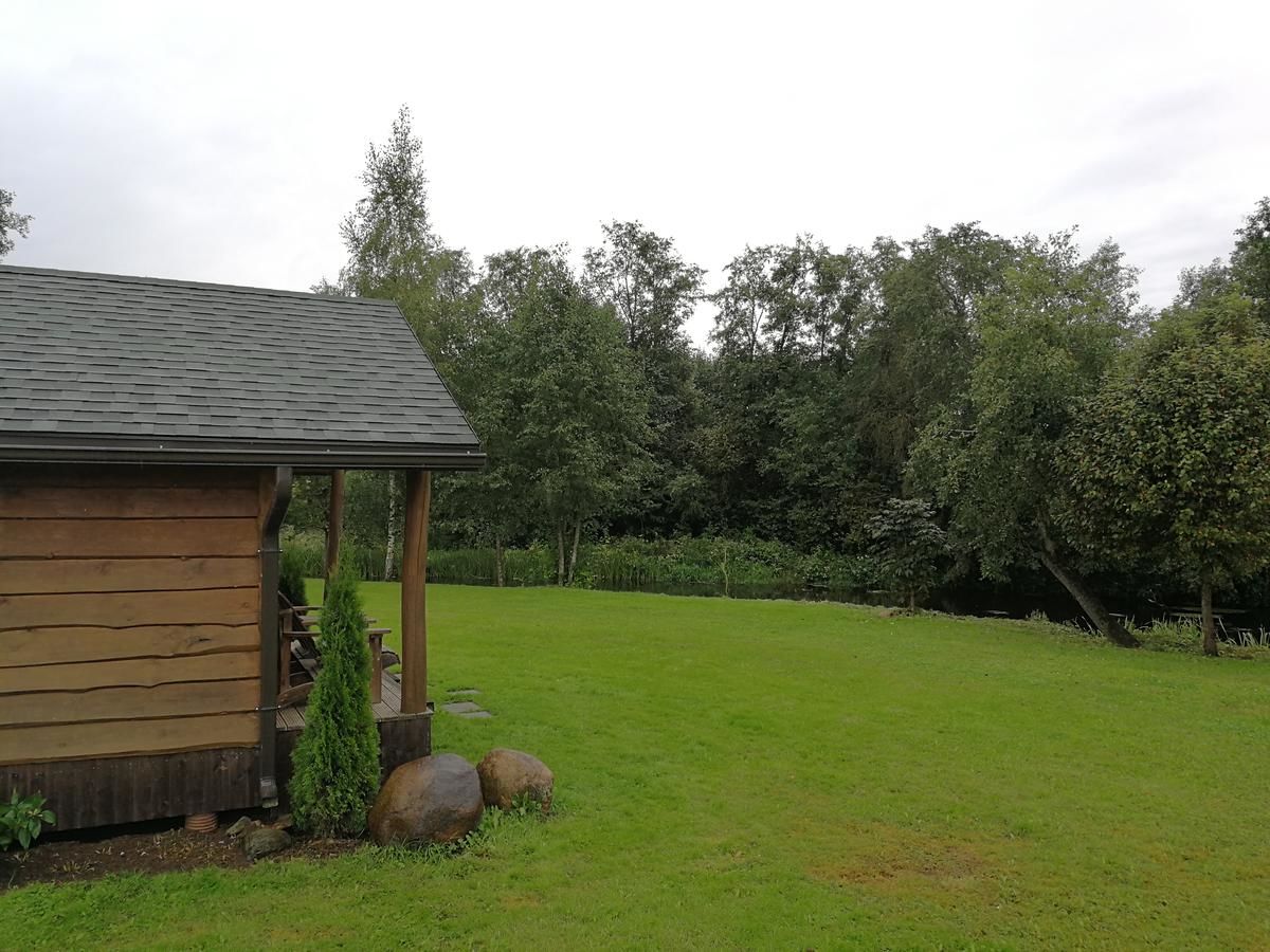 Кемпинги Iecupes wooden cabin with view to river Иецава