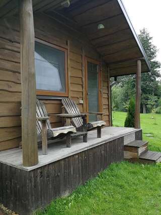 Кемпинги Iecupes wooden cabin with view to river Иецава-7