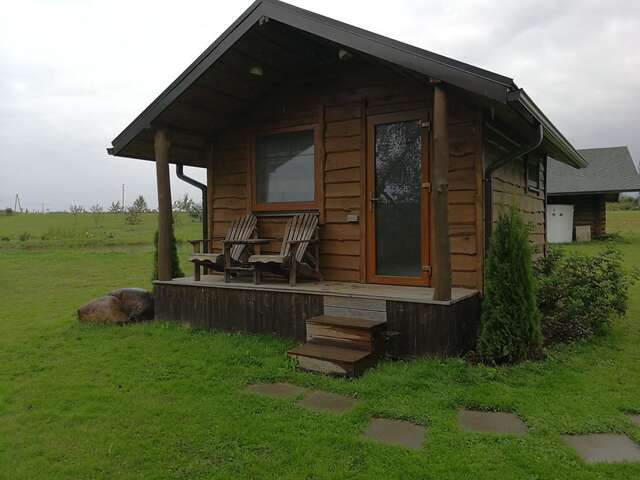 Кемпинги Iecupes wooden cabin with view to river Иецава-3