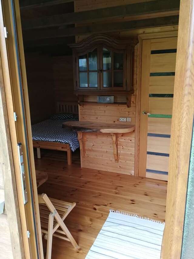 Кемпинги Iecupes wooden cabin with view to river Иецава-12