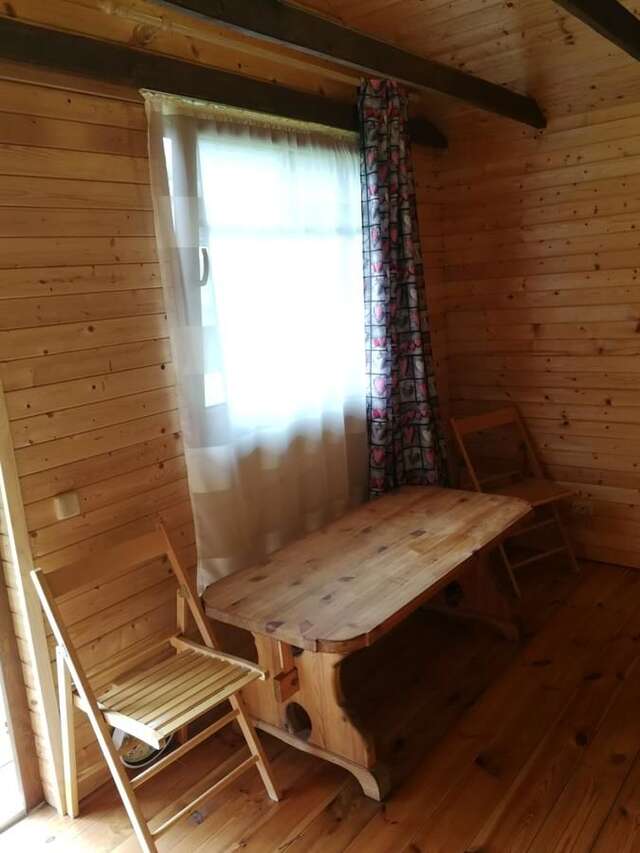 Кемпинги Iecupes wooden cabin with view to river Иецава-13